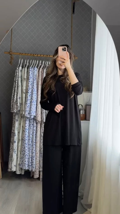 Schwarzes Set mit Longtop und weiter Hose